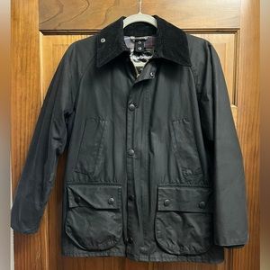Barbour Jacket. See tag for size. IMO, fits like a women’s large